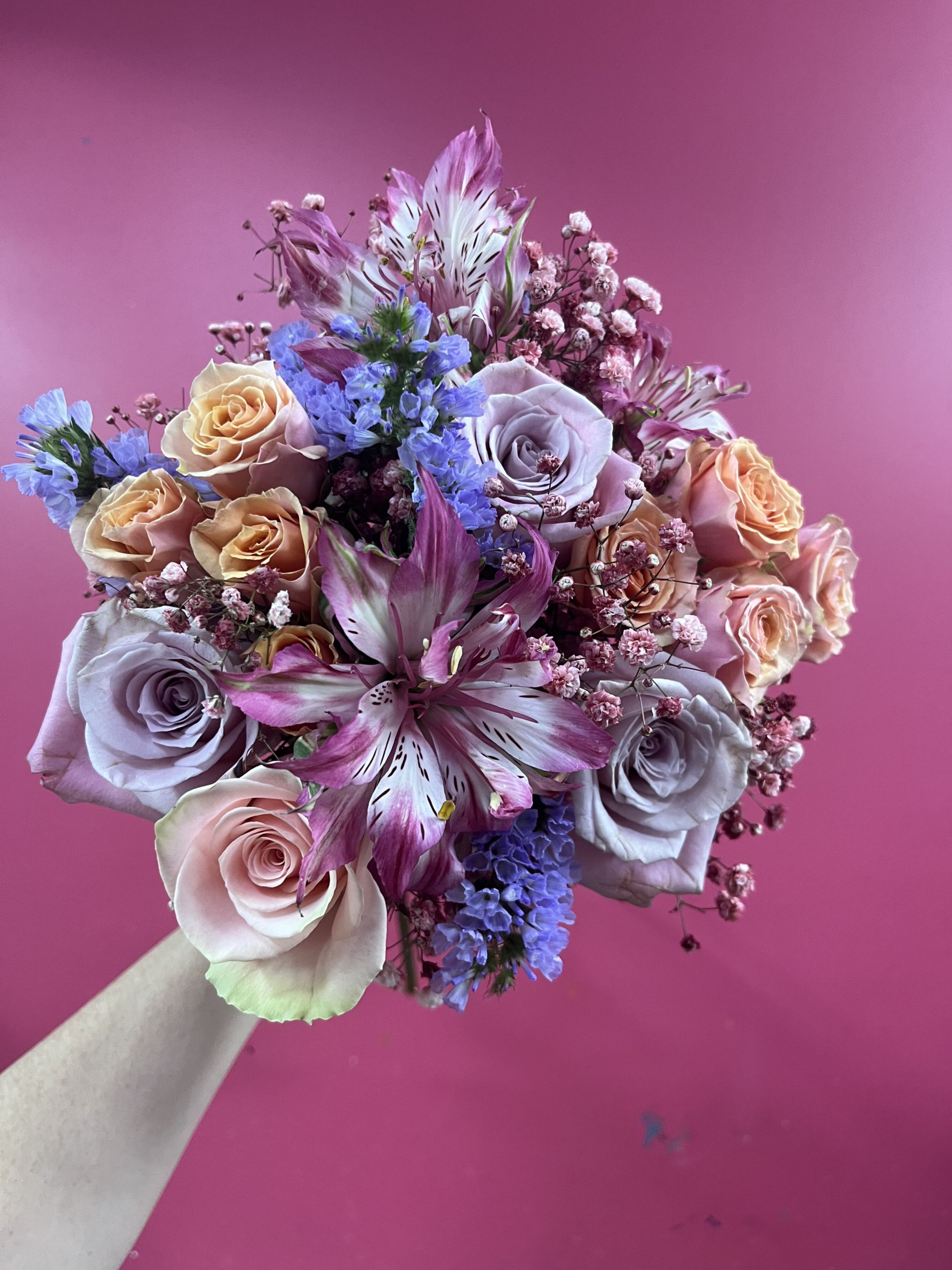 Pastel bouquet with roses and lilies